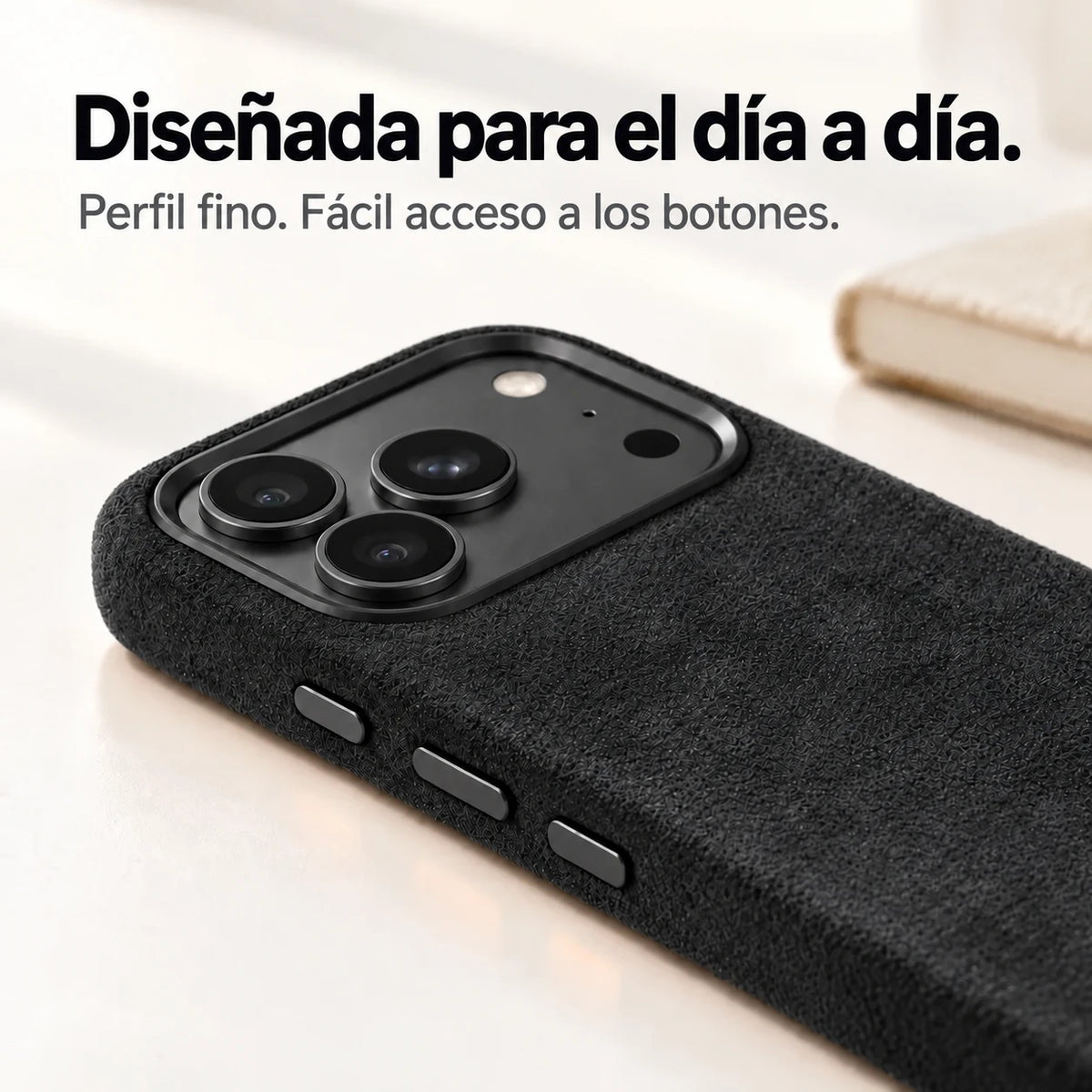 Black fabric phone case with a close view of its slim side and controls. #color_Midnight Black