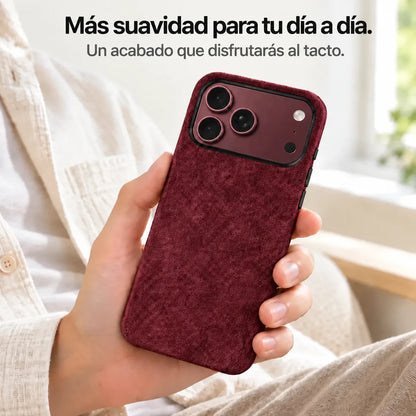 Burgundy fabric phone case held in one hand, with a matching Burgundy phone and black camera rim. #color_Burgundy