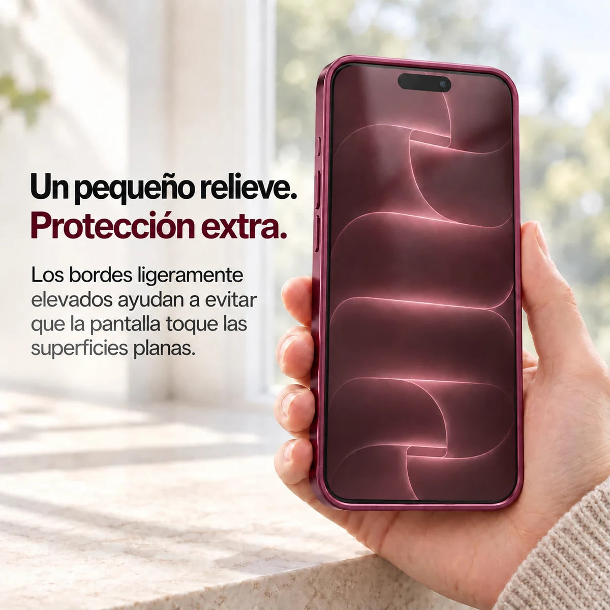 Burgundy metal phone case held with the front display and raised screen edges visible #color_Burgundy