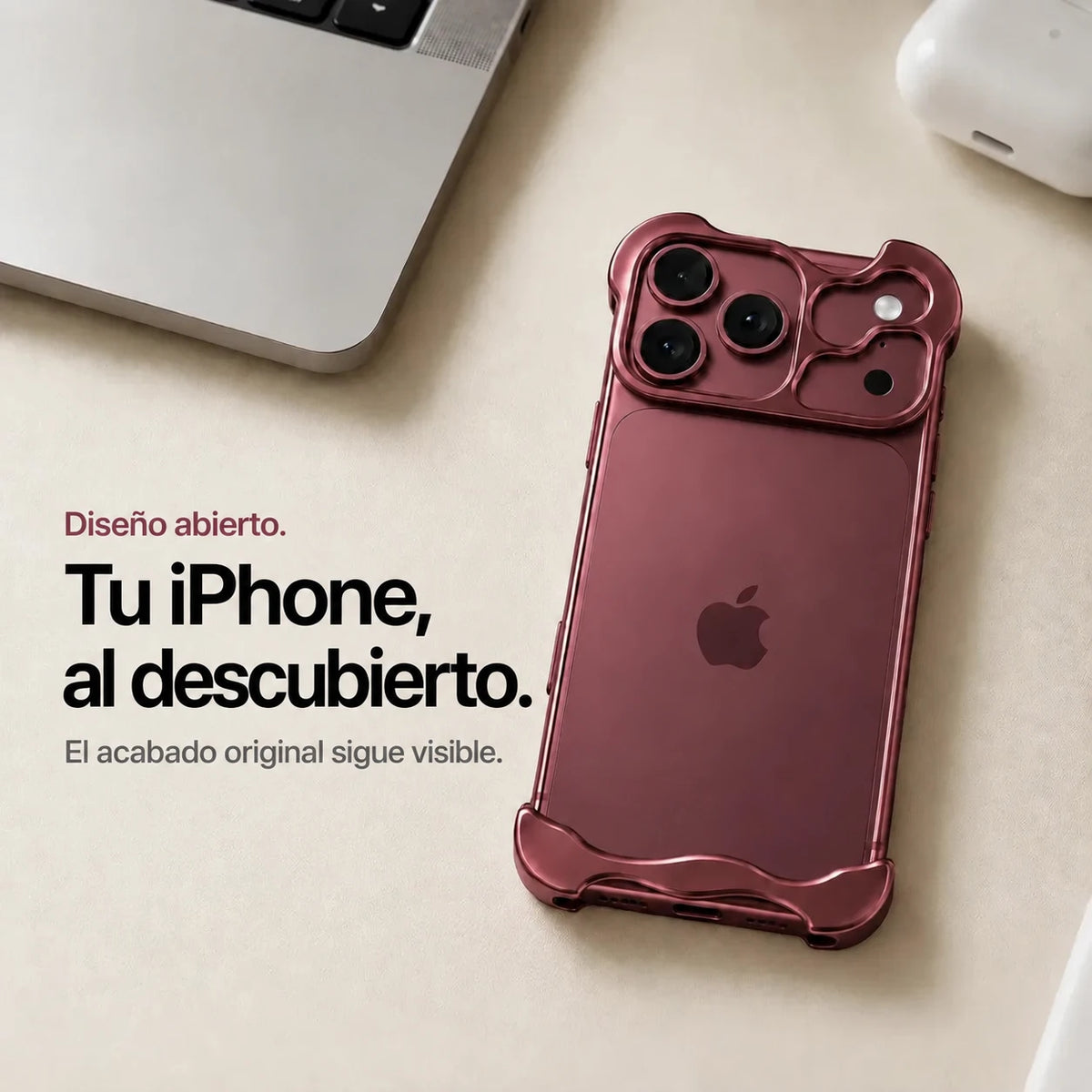 Burgundy sculpted metal phone case on a desk showing the open back #color_Burgundy