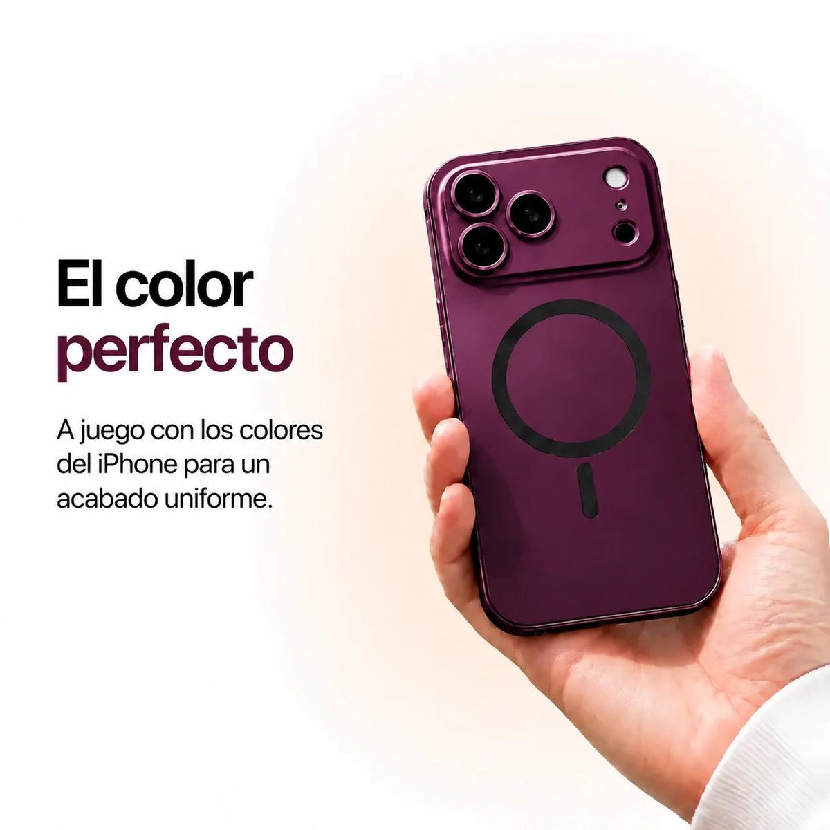 Burgundy metal magnetic phone case held in one hand against a pale studio background #color_Burgundy