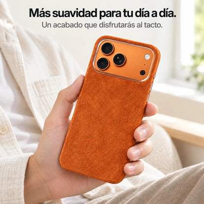 Orange fabric phone case held in one hand, showing its textured back. #color_Cosmic Orange