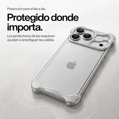 Silver sculpted metal phone case on a desk showing its protective corner bumpers #color_Titanium Silver