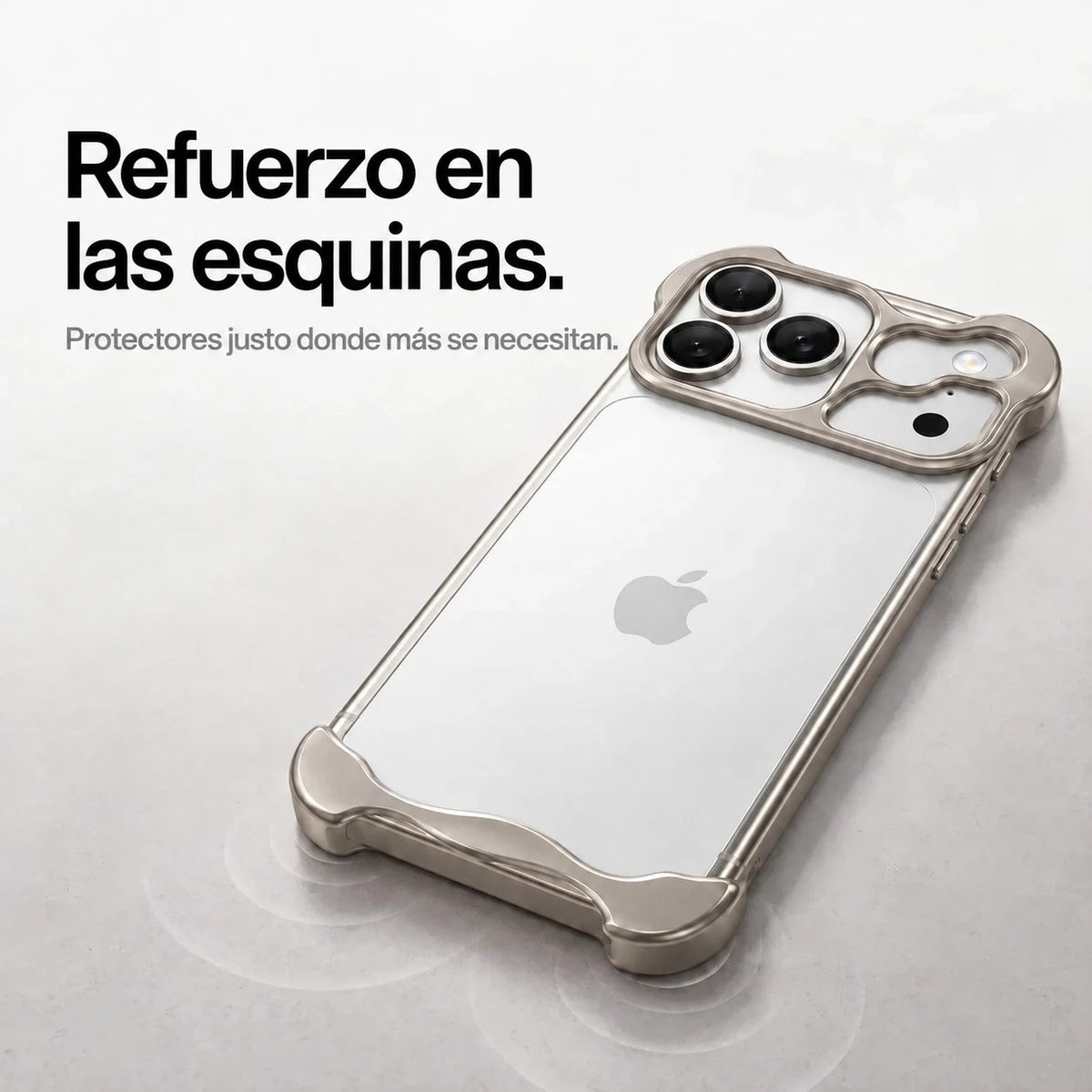 Warm gray sculpted metal phone case on a desk showing its protective corner bumpers #color_Natural Titanium
