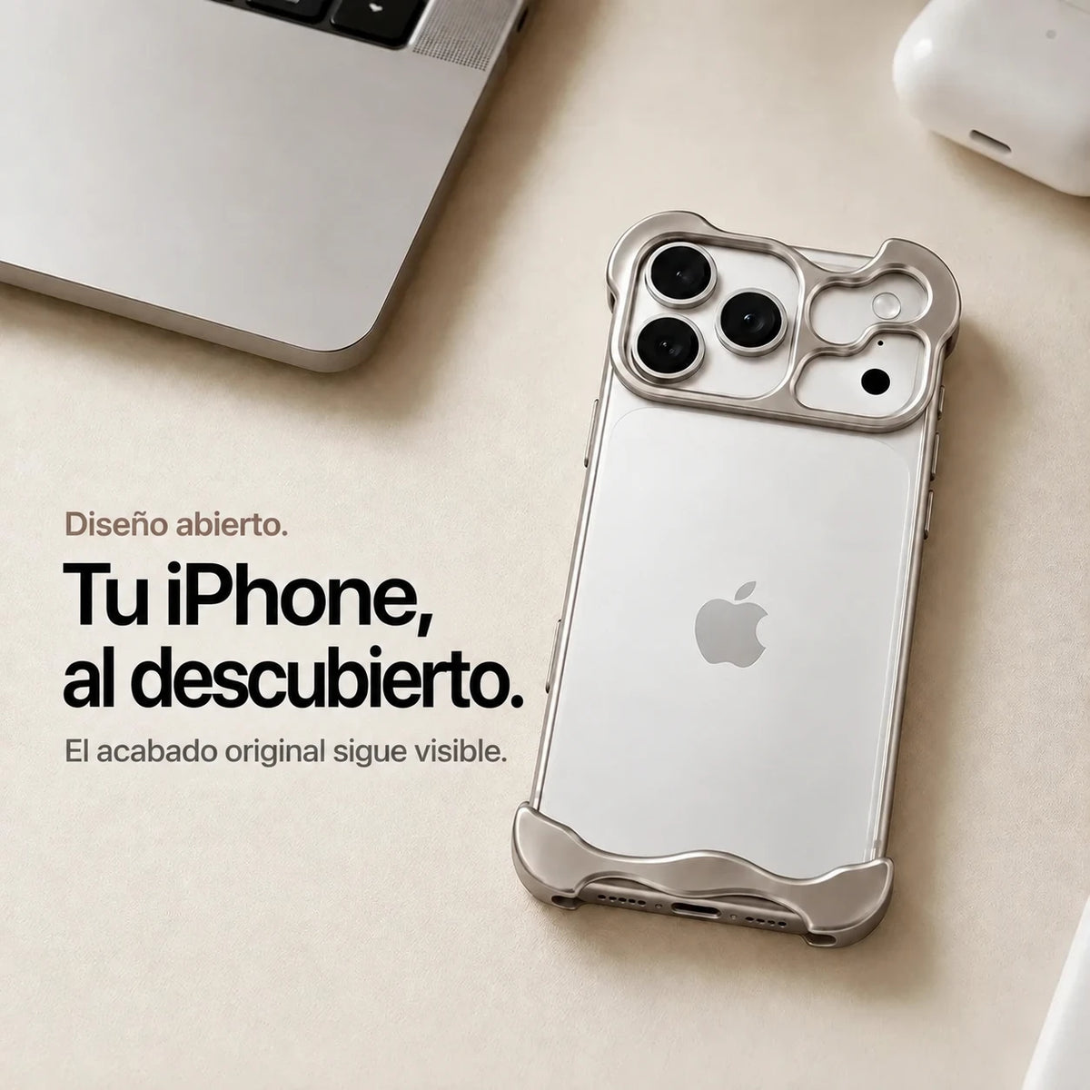 Warm gray sculpted metal phone case on a desk showing the open back #color_Natural Titanium
